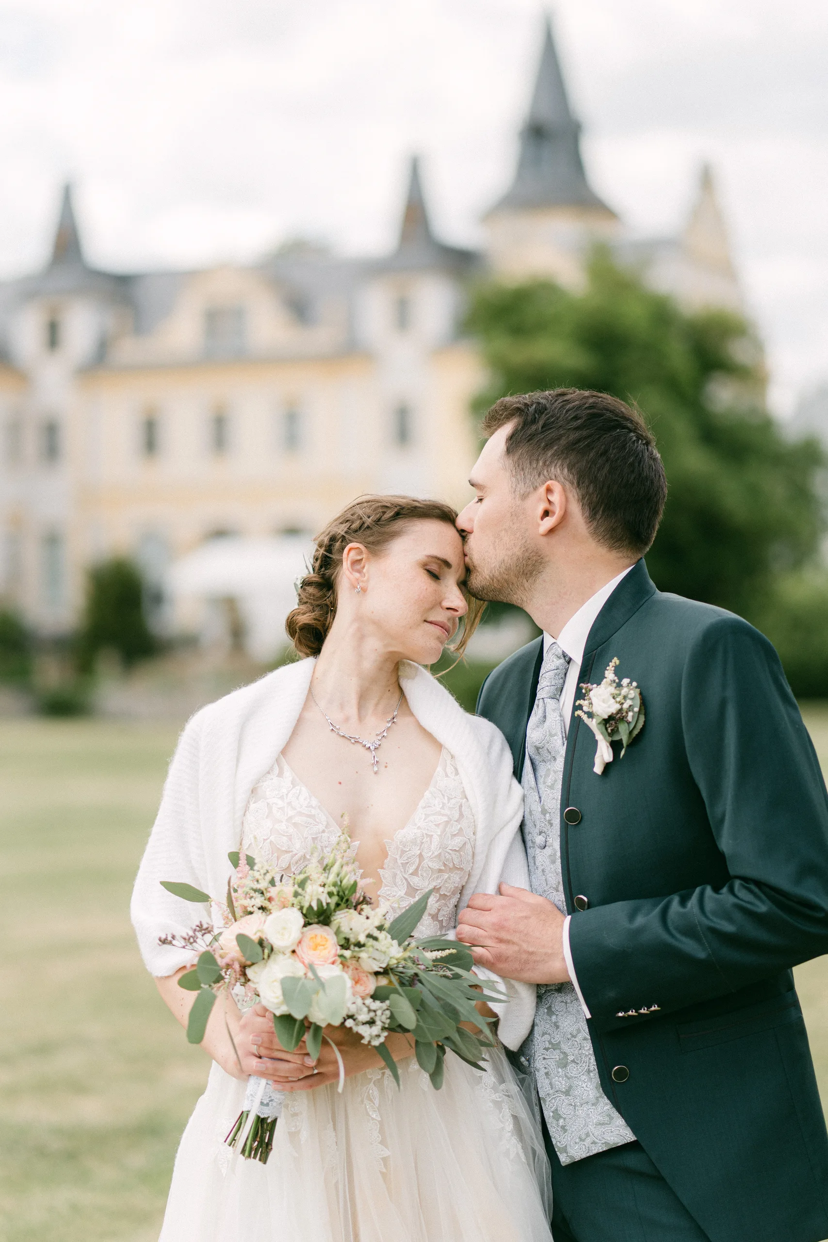 Intimate forehead kiss during a Germany elopement