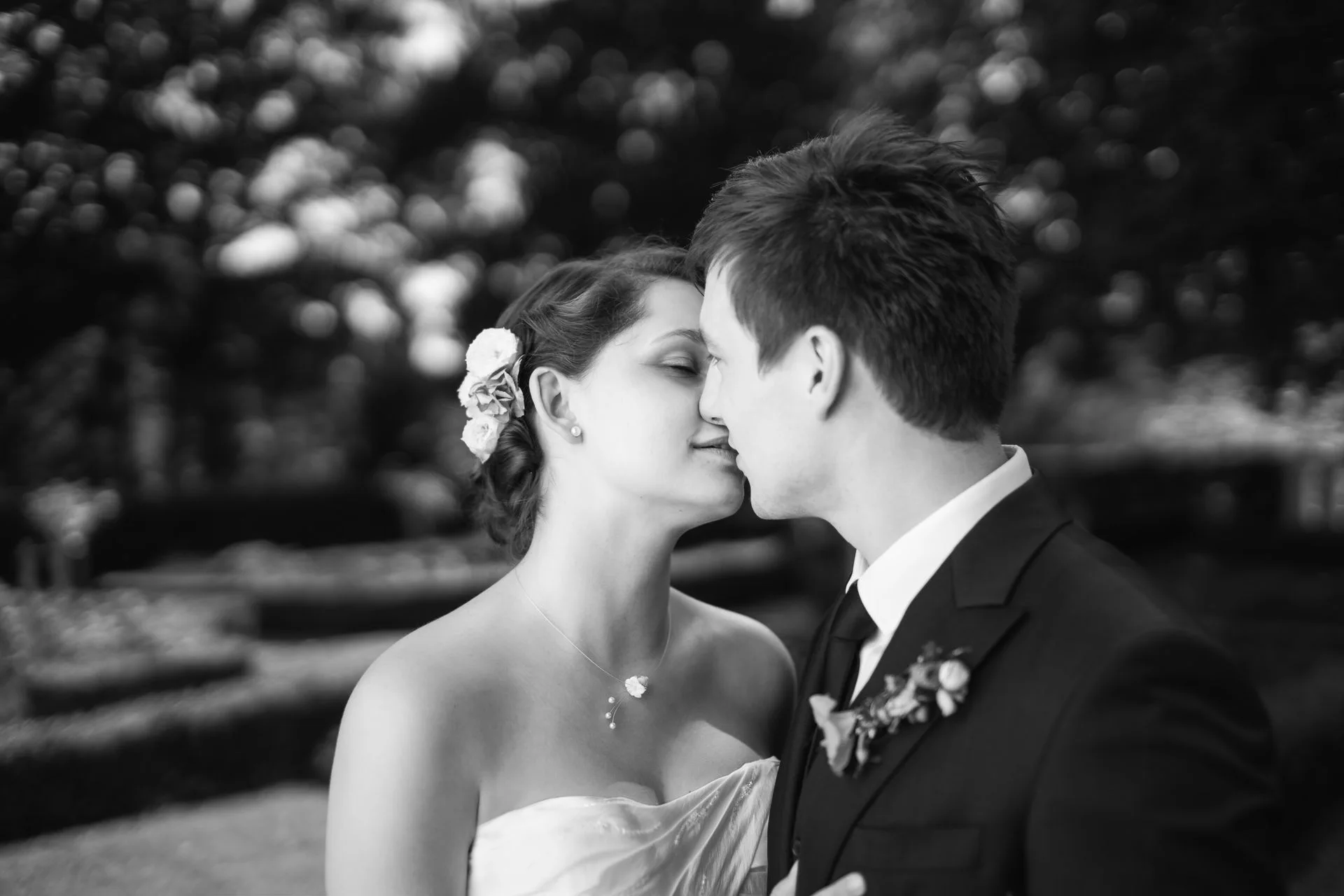 Black and white kiss at an intimate wedding