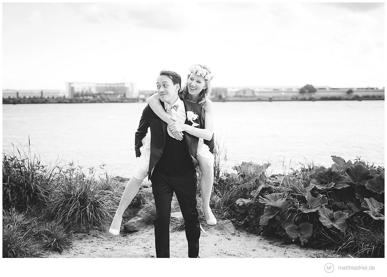 Wedding couple by the Elbe at Hotel Louis C. Jacob, Hamburg
