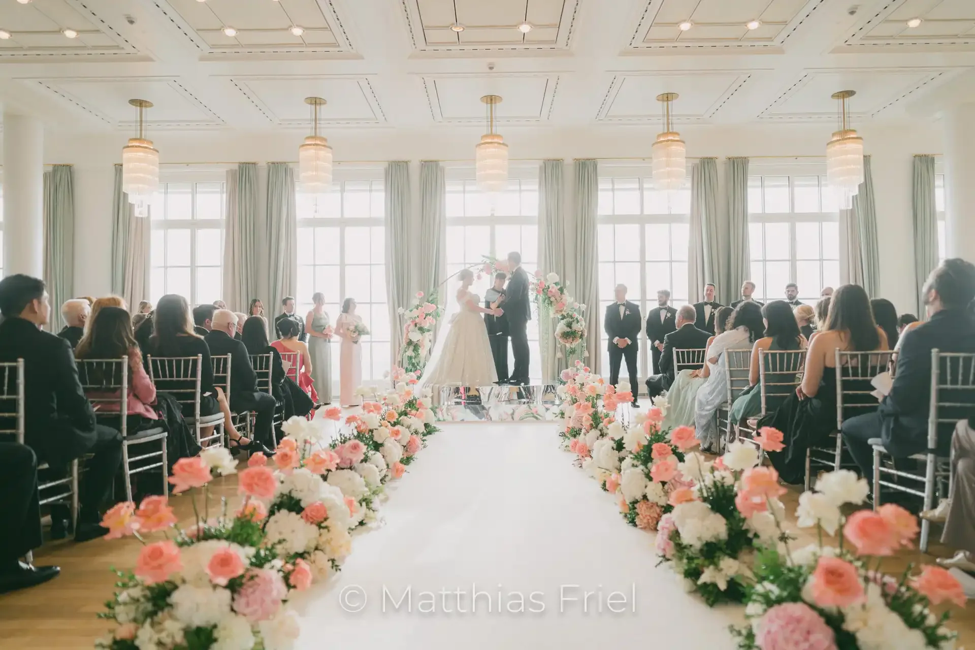 Wedding ceremony with flower-lined aisle at Grandhotel Petersberg
