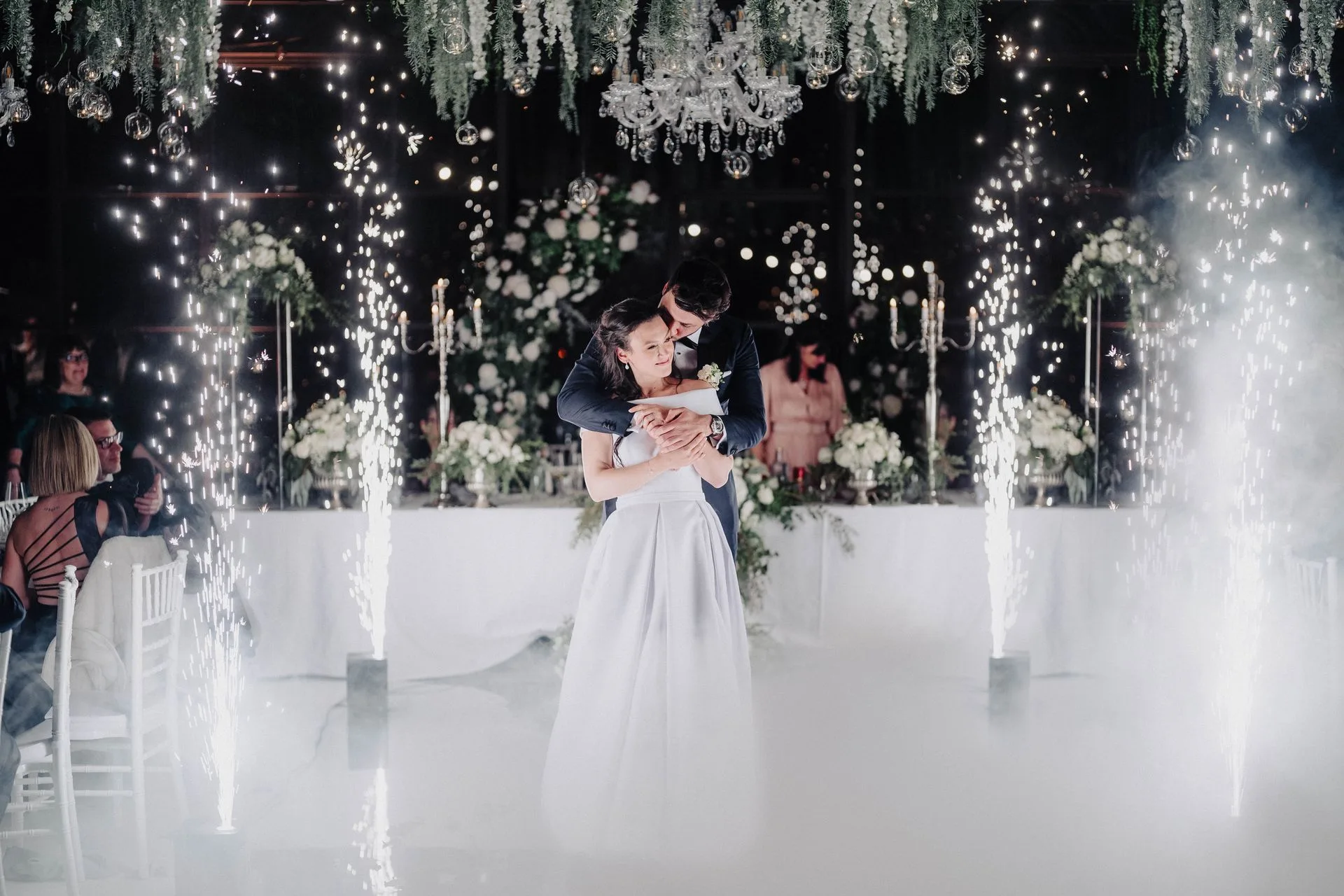Couple surrounded by sparklers and fog at Schloss Freudenstein